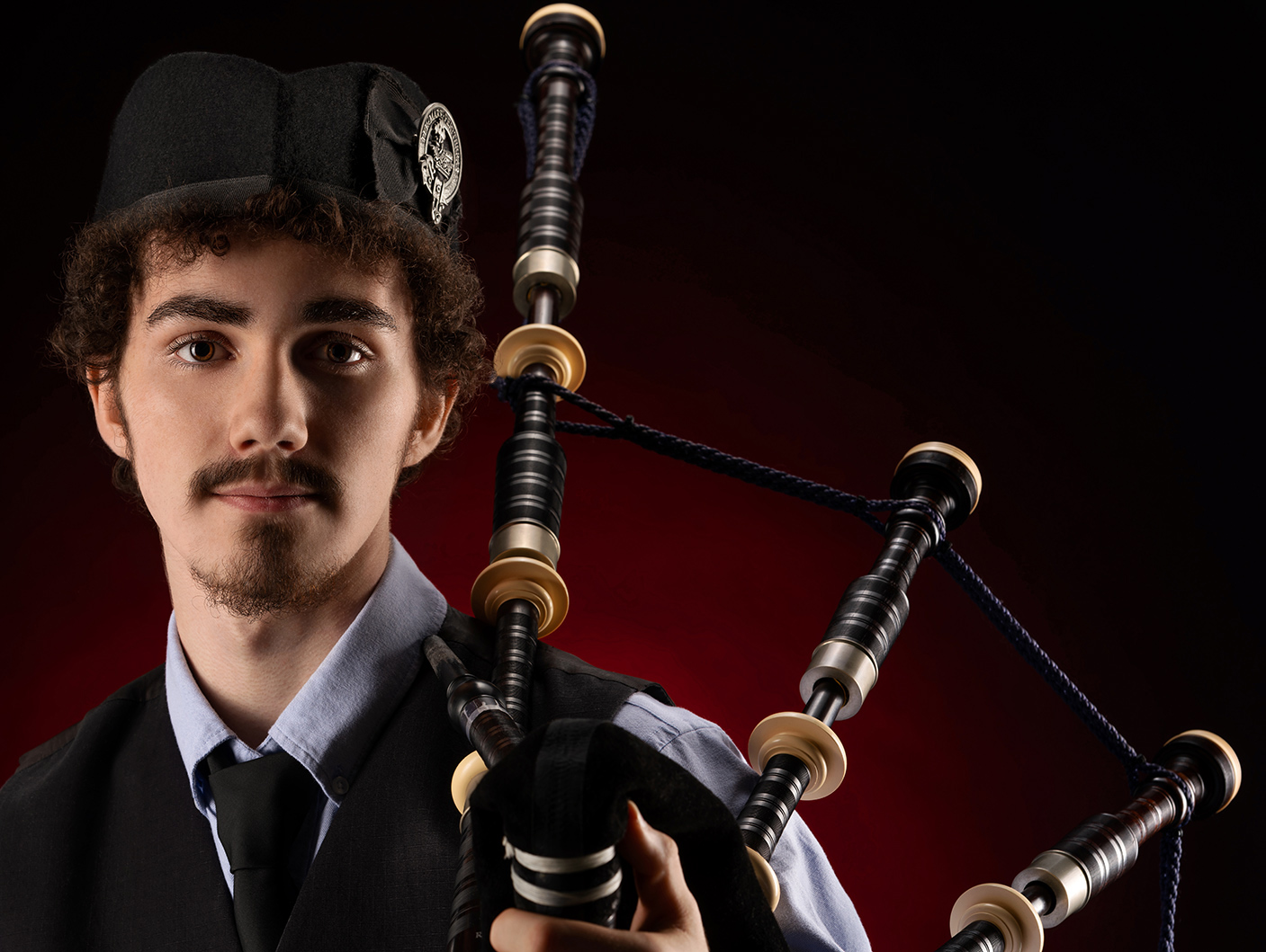 headshot of bagpipes high school senior pictures